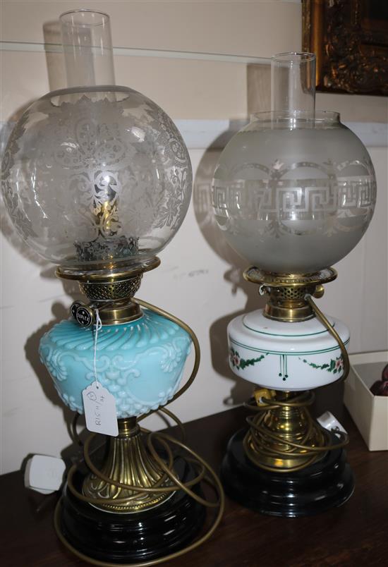 Turquoise and clear glass oil lamp and another